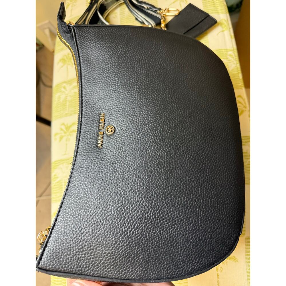 Anne Klein black pebbled crossbody gold accents, new condition has two straps